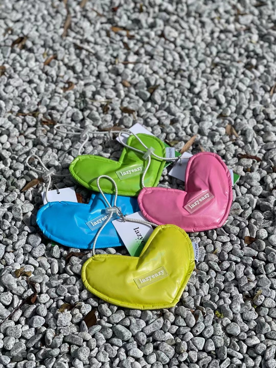 Four puffy heart-shaped waterproof bandana for dogs and cats.