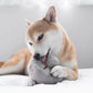 A shiba playing with the GUU snuffle mushroom dog enrichment toy by Lambwolf Collective.