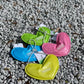 Four puffy heart-shaped waterproof bandana for dogs and cats.